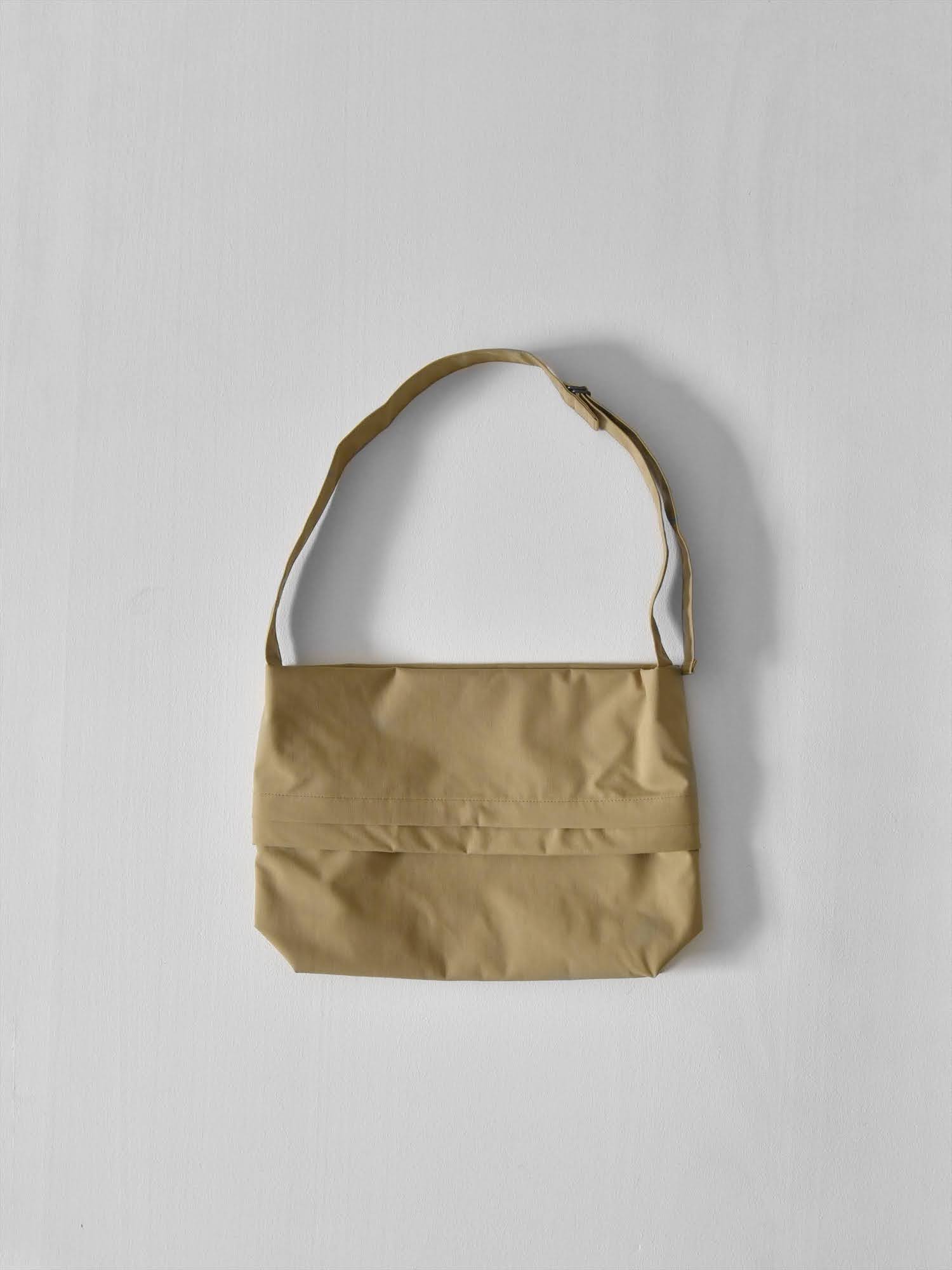 TRANSFORM BAG size M beige / pand catalogue